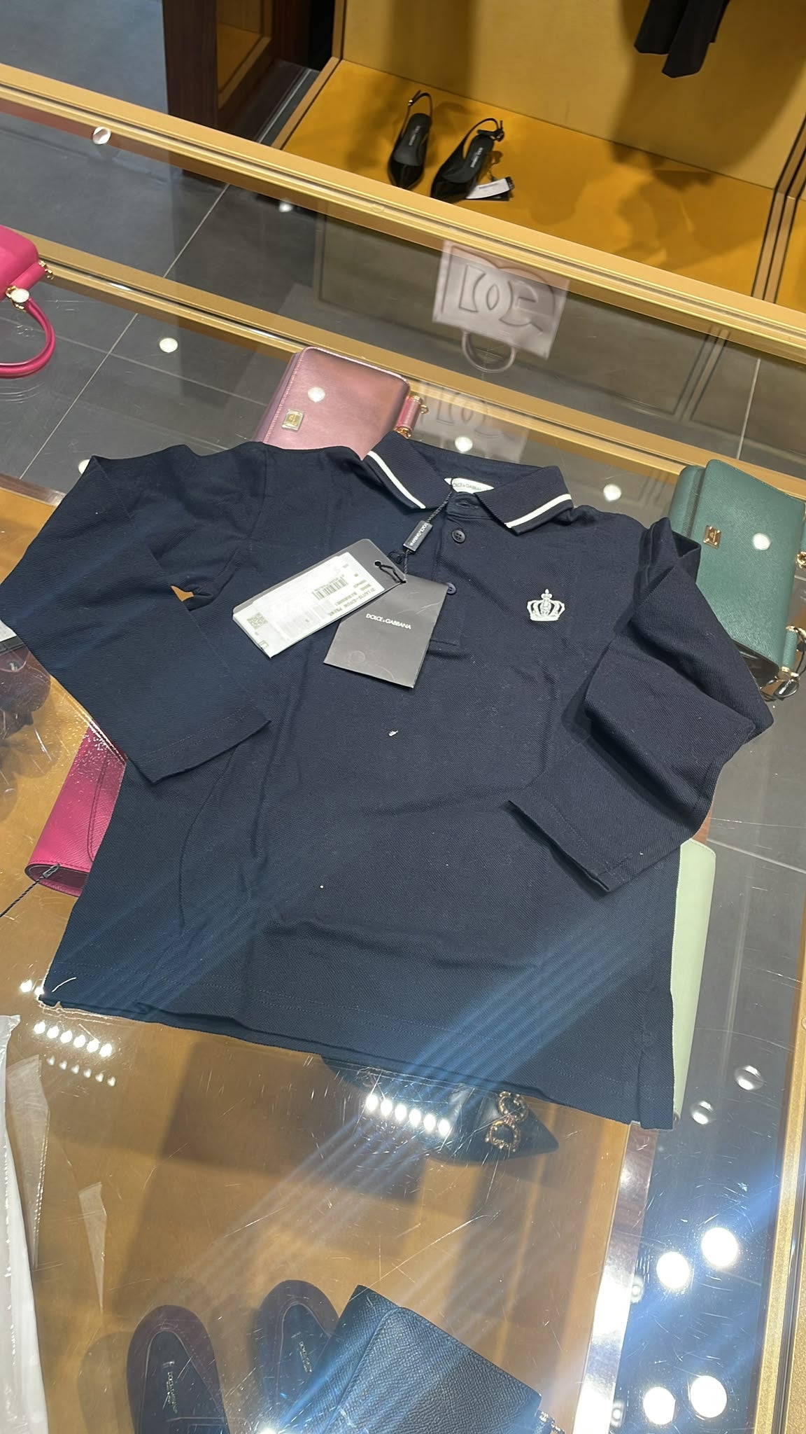 Long-sleeved polo shirt with crown embroidery