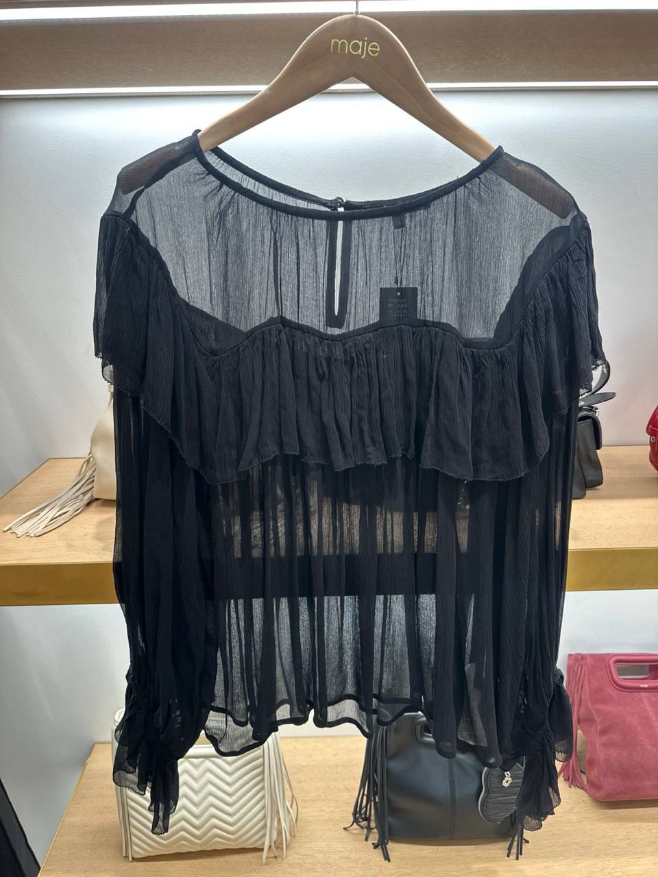 Ruffled sheer blouse
