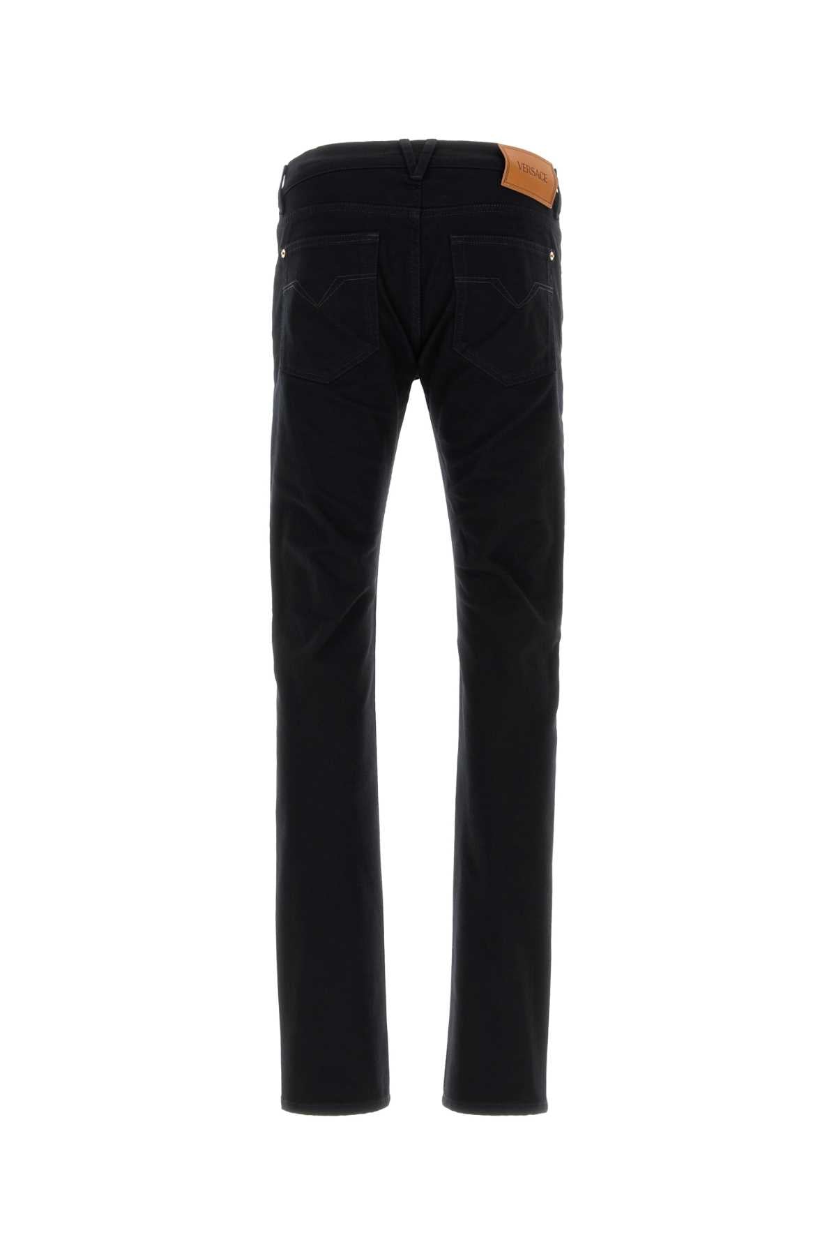 VERSACE PANT DENIM REACTIVE BLACK STRETCH DENIM FABRIC For Men 1.Outer Fabric:1% Elastane, 99% CottonTrim:100% Calf leather