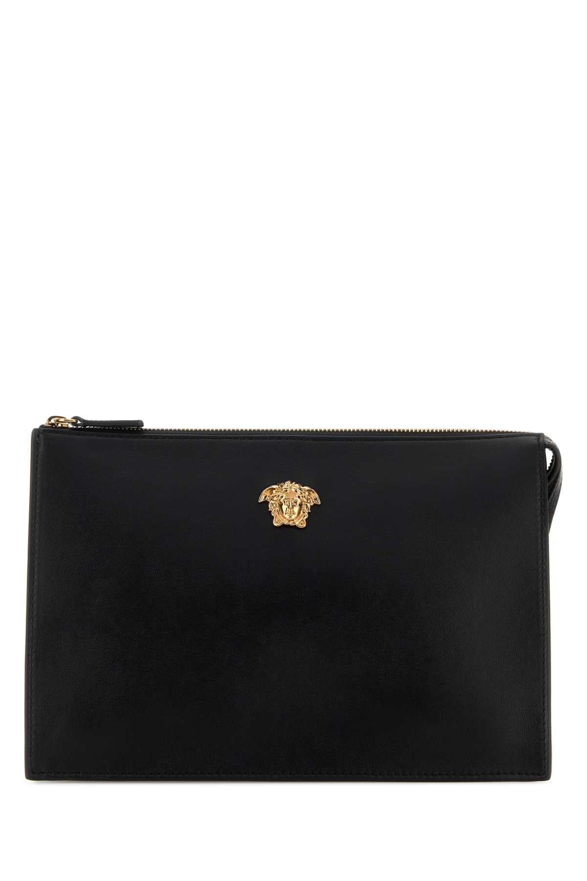 VERSACE POUCH STANDING CALF LEATHER For Men Exterior: 100% Calf Lining: 100% Fabric Finishing: Golden metal
