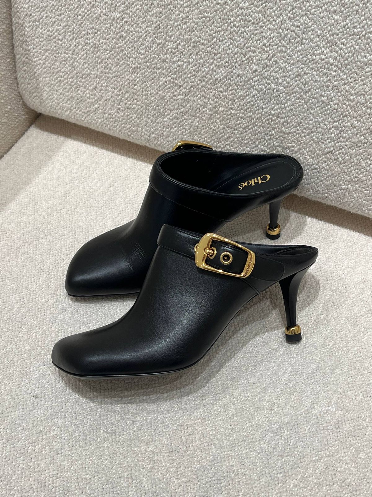 Buckle-detailed leather mules