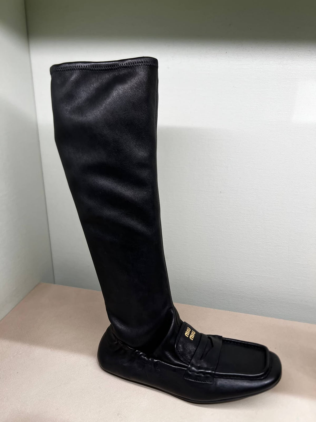 Leather knee-high loafers
