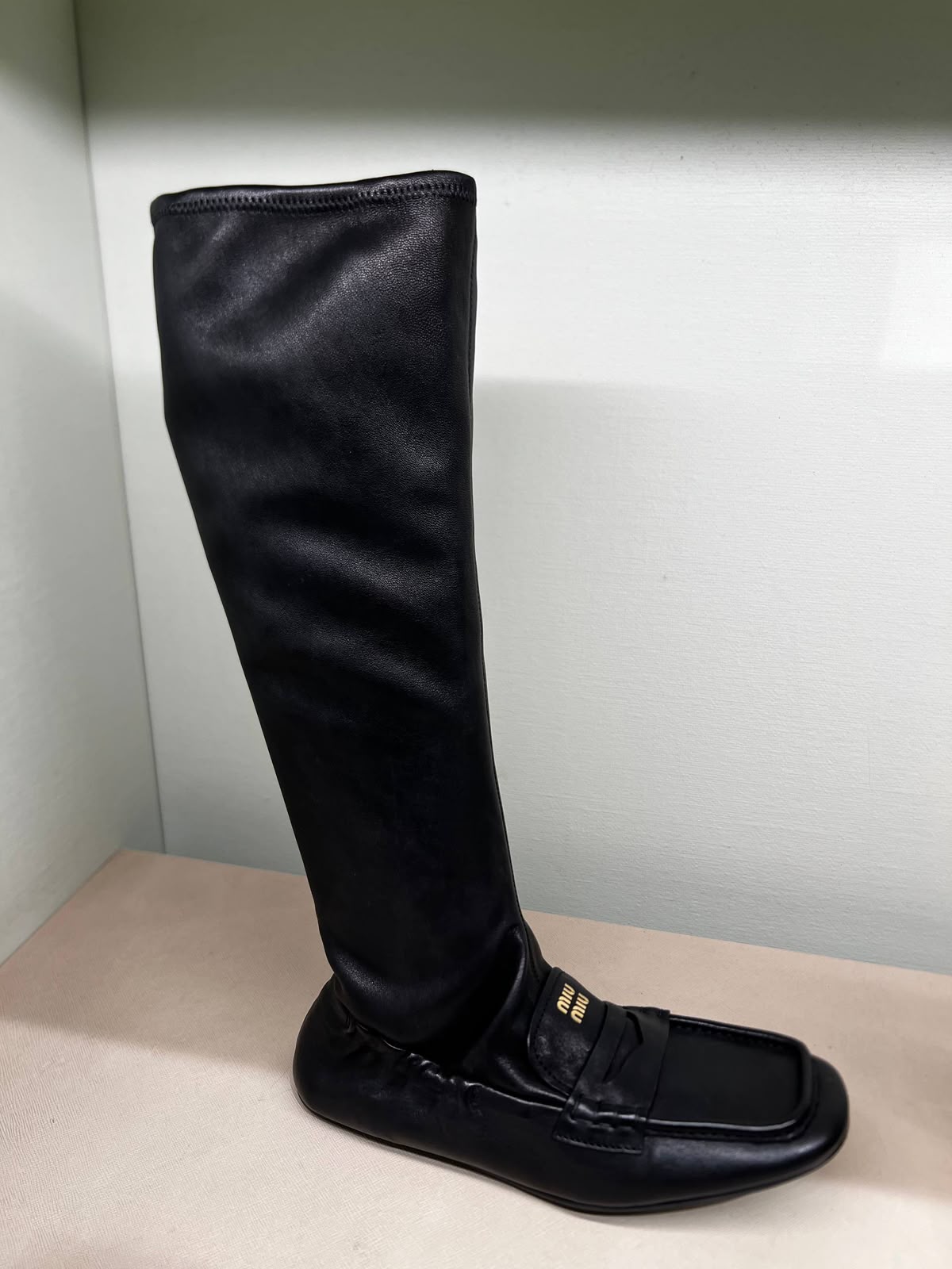 Leather knee-high loafers