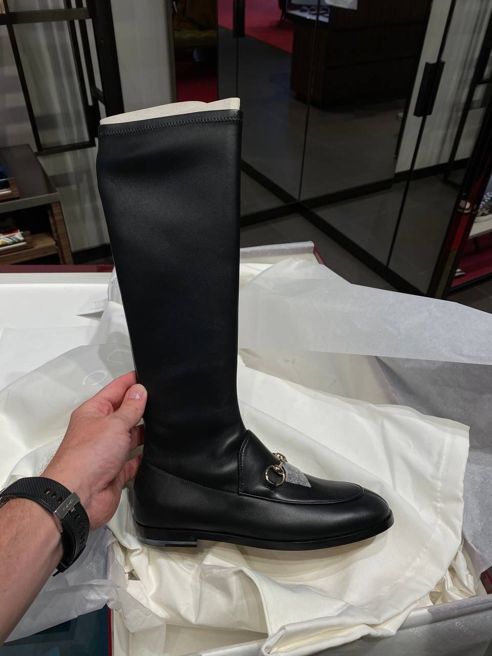 Horsebit knee-high boot
