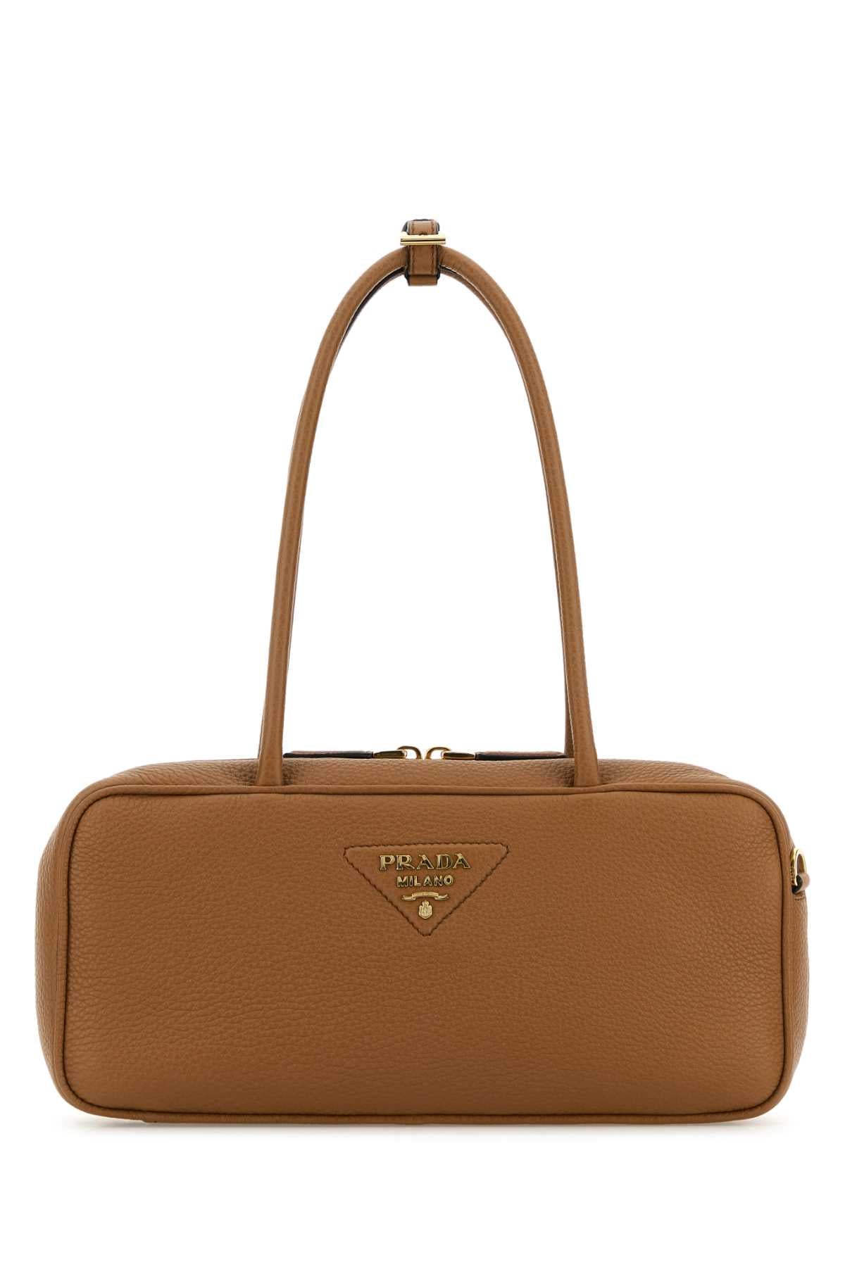 PRADA BAULETTO For Women Exterior: 100% Deer Lining: 100% Leather Finishing: Golden metal