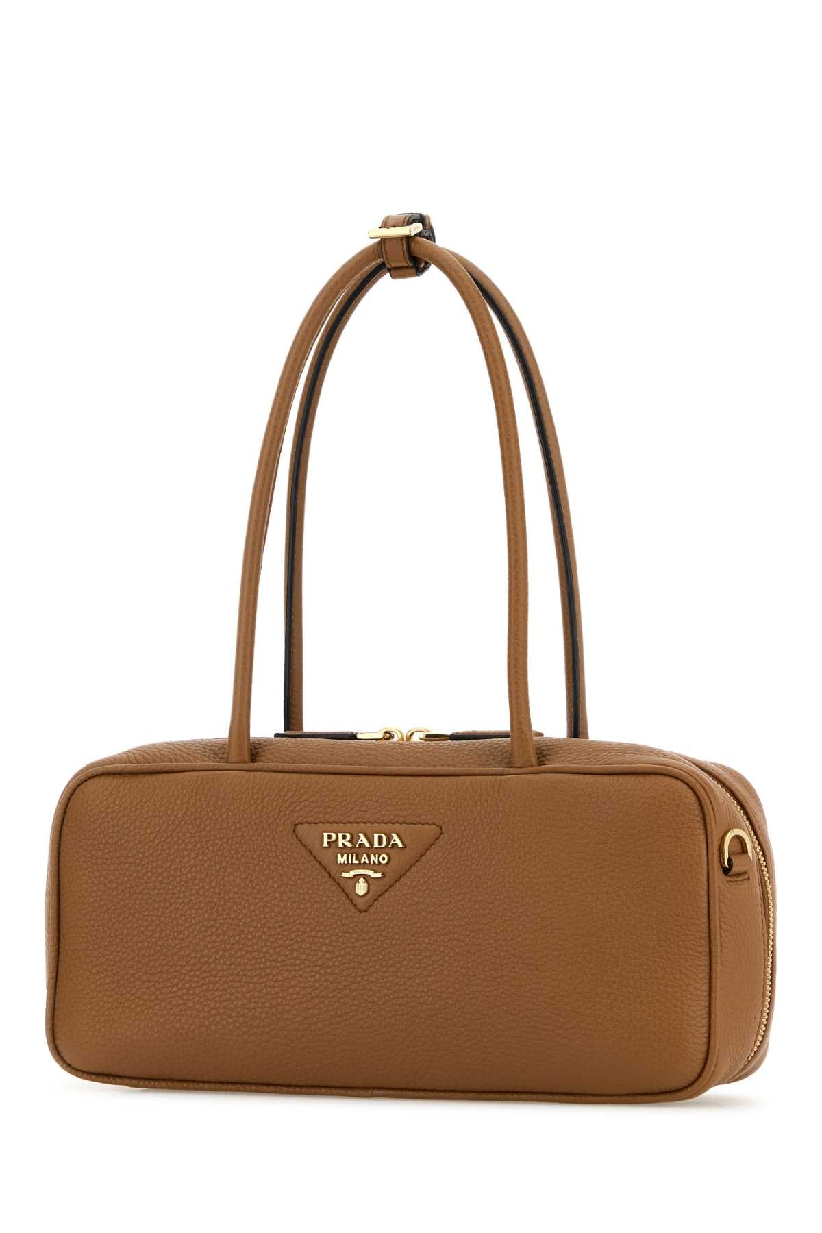 PRADA BAULETTO For Women Exterior: 100% Deer Lining: 100% Leather Finishing: Golden metal