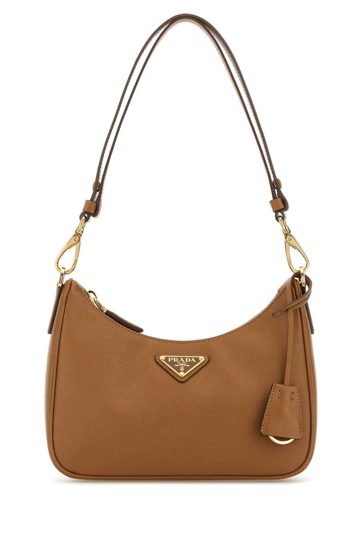 PRADA PELLE For Women Exterior: 100% Leather Lining: 100% Re-Nylon Finishing: Golden metal