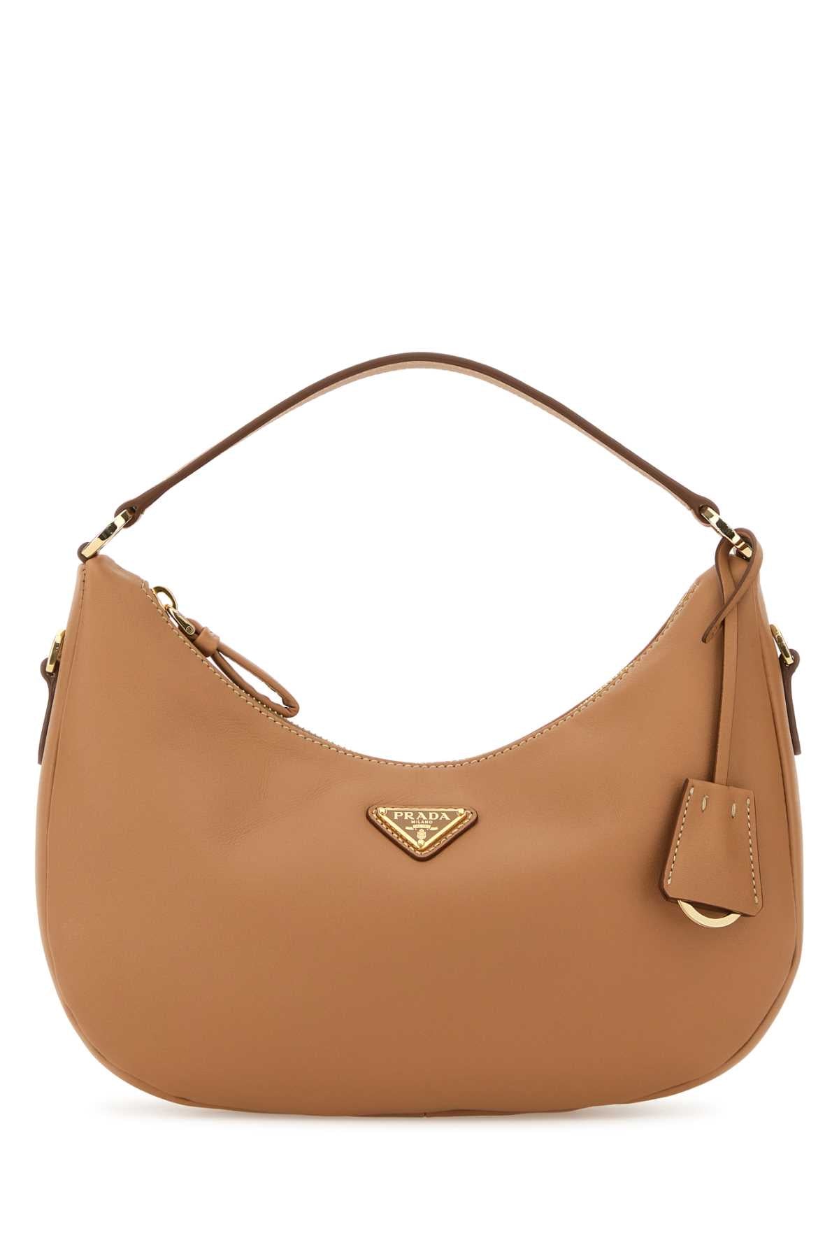 PRADA PELLE For Women Exterior: 100% Leather Lining: 100% Fabric Finishing: Goden metal