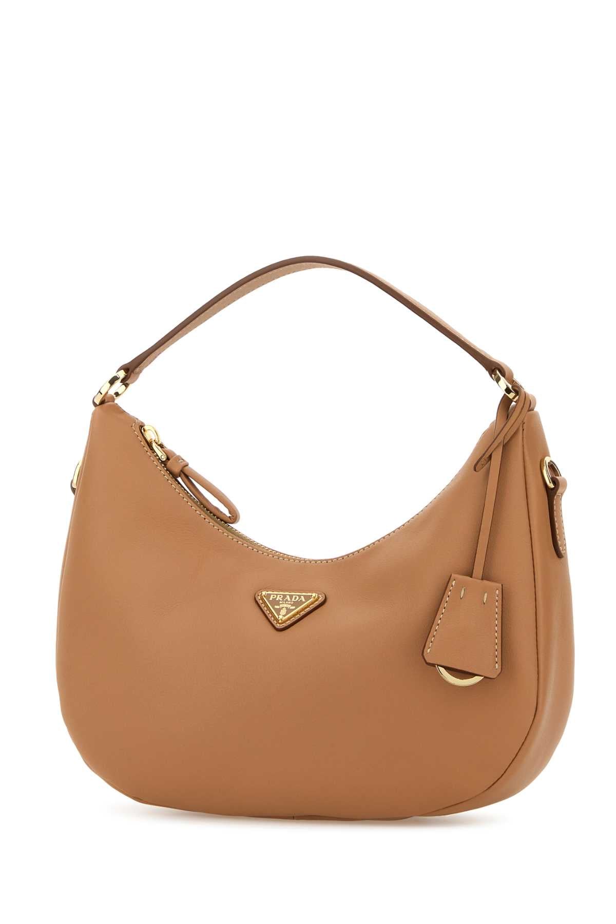 PRADA PELLE For Women Exterior: 100% Leather Lining: 100% Fabric Finishing: Goden metal