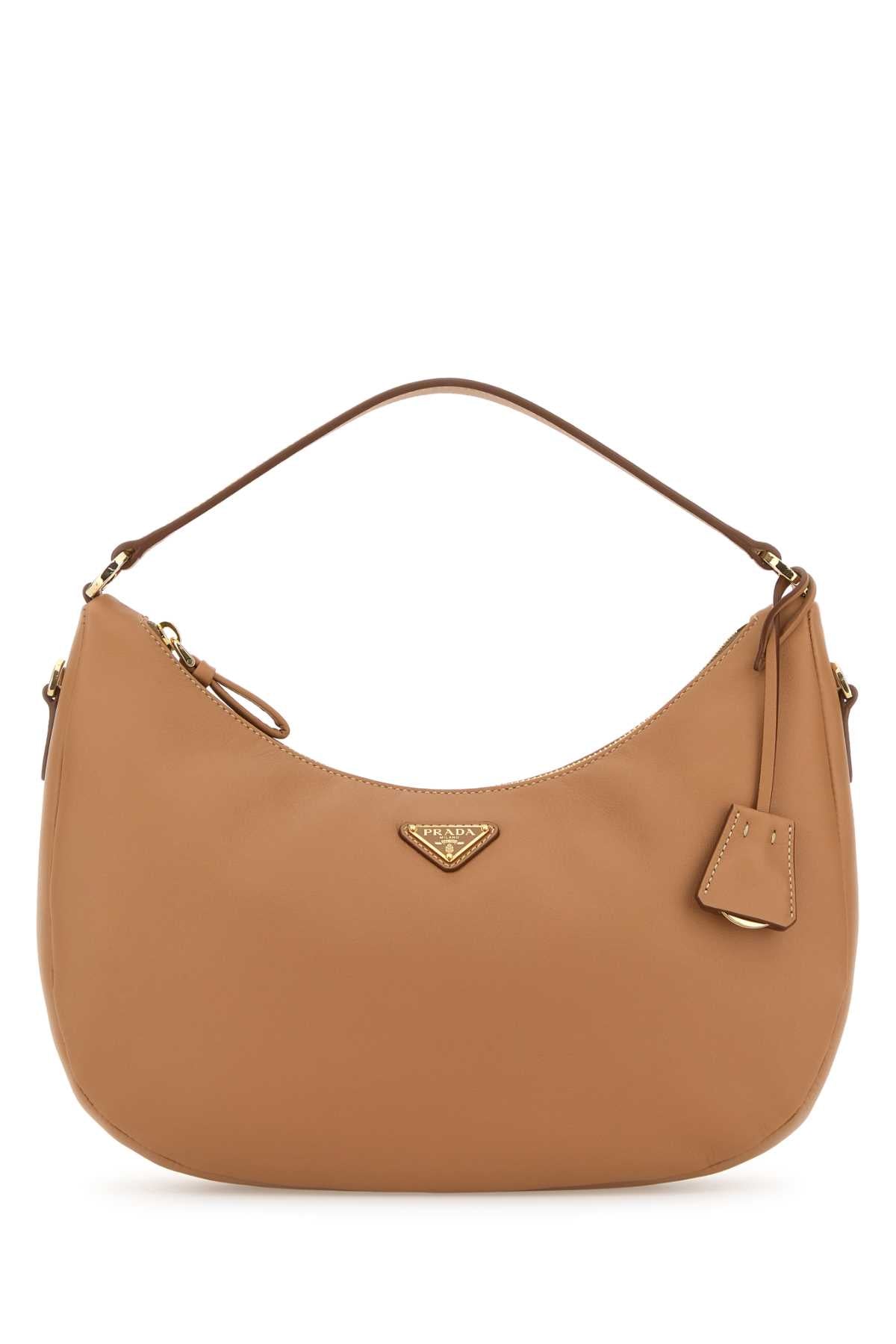 PRADA PELLE For Women Exterior: 100% Leather Lining: 100% Fabric Finishing: Golden metal