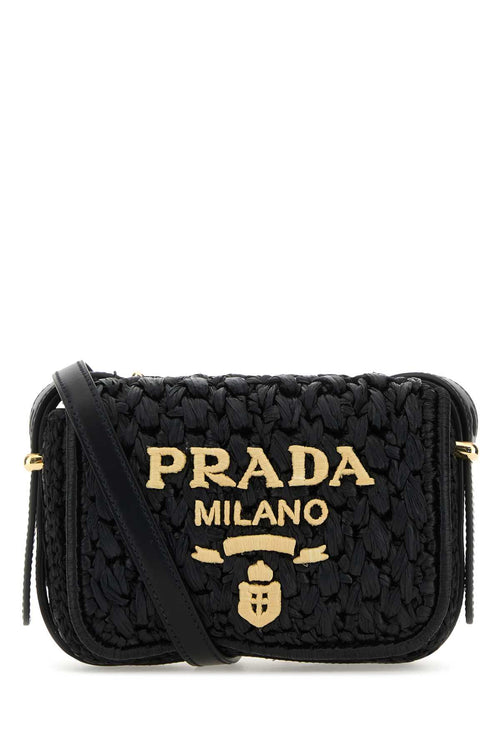 PRADA BORSA For Women Exterior: 100% Raffia 100% Leather Lining: 100% Leather Finishing: Golden metal
