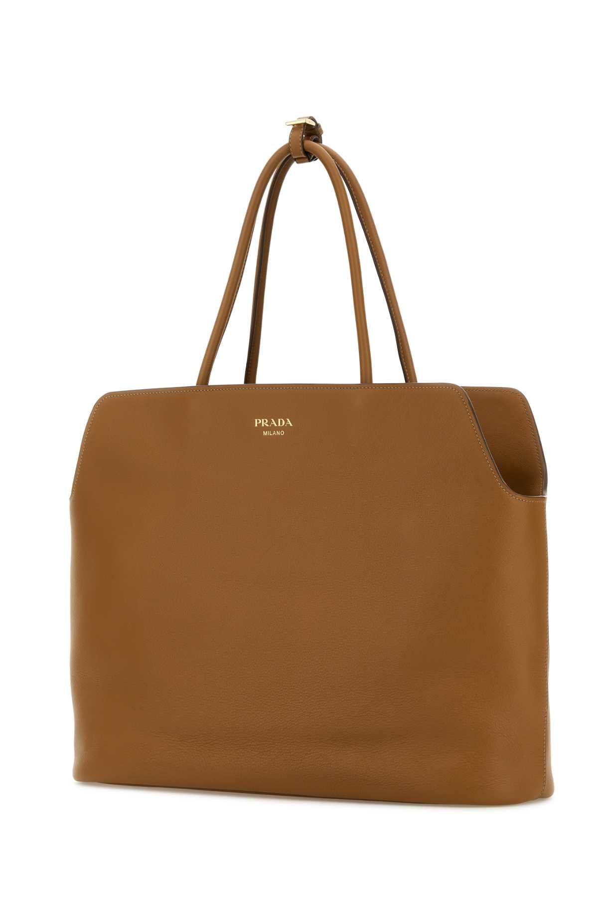 PRADA SHOPPING For Women Exterior: 100% Leather Lining: 100% Fabric 100% Leather Finishing: Golden metal