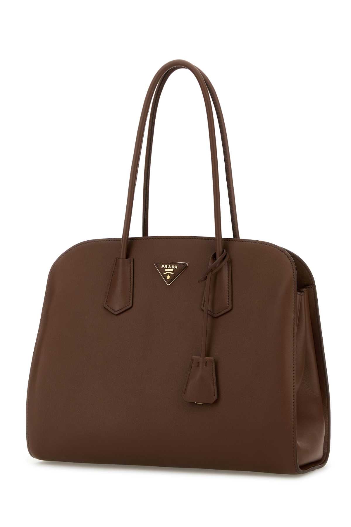 PRADA SHOPPING For Women Exterior: 100% Leather Lining: 100% Fabric Finishing: Golden metal