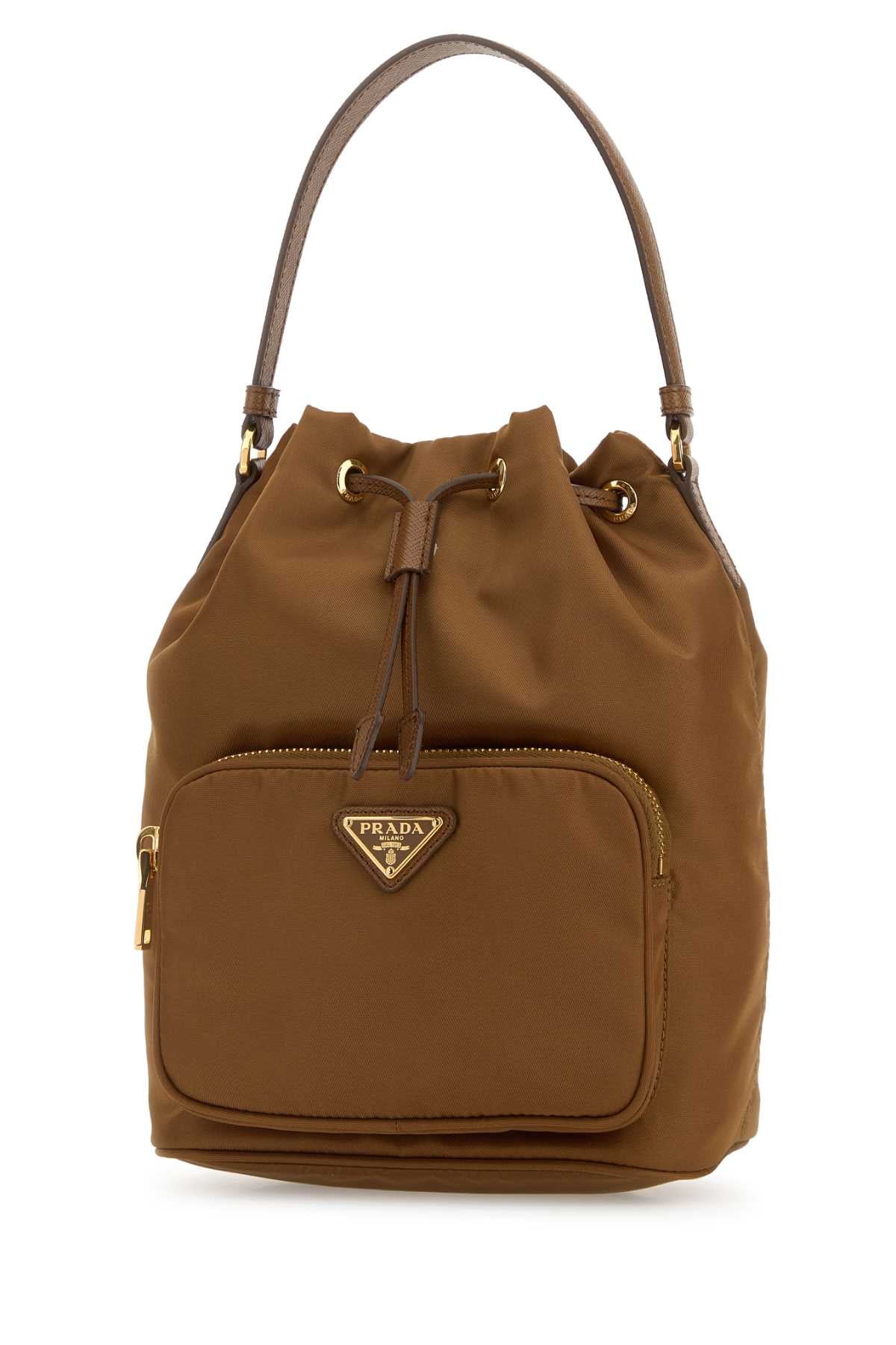 PRADA TESSUTO For Women Exterior: 100% Re-Nylon Lining: 100% Fabric Finishing: Golden metal