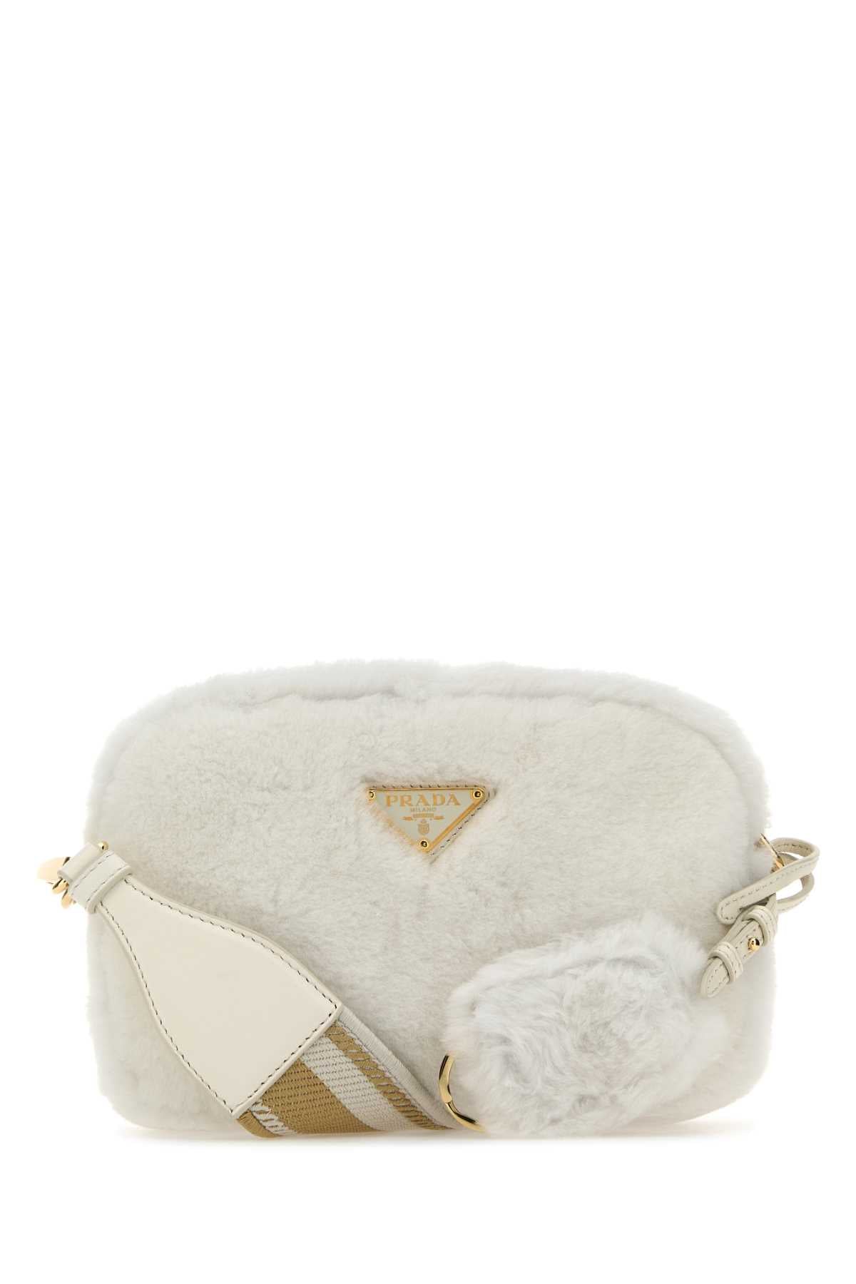 PRADA BANDOLIERA For Women Exterior: 100% Shearling Lining: 100% Leather 100% Fabric Finishing: Golden metal