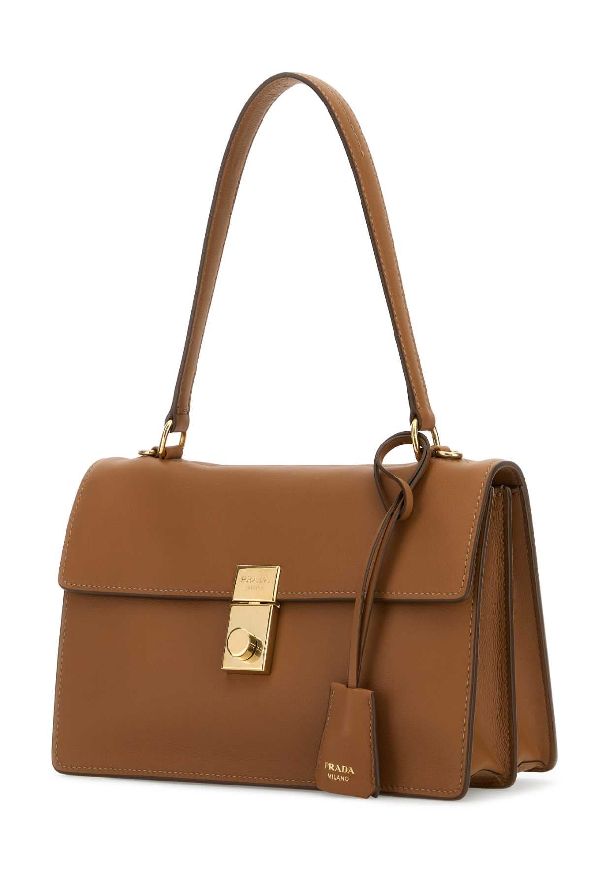PRADA CARTELLA For Women Exterior: 100% Leather Lining: 100% Leather Finishing: Golden metal