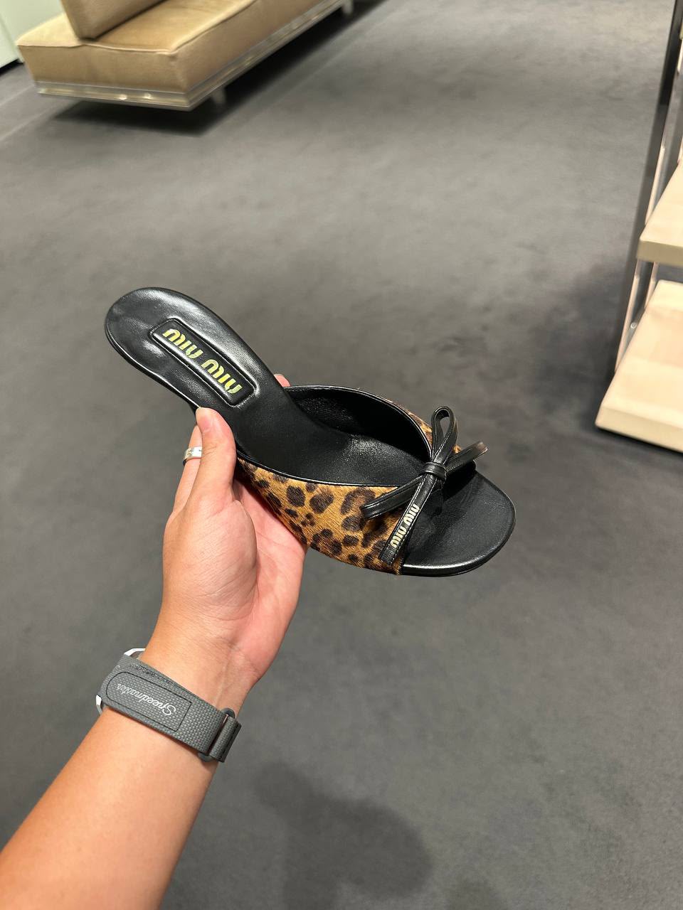 Leopard-print calf hair slides