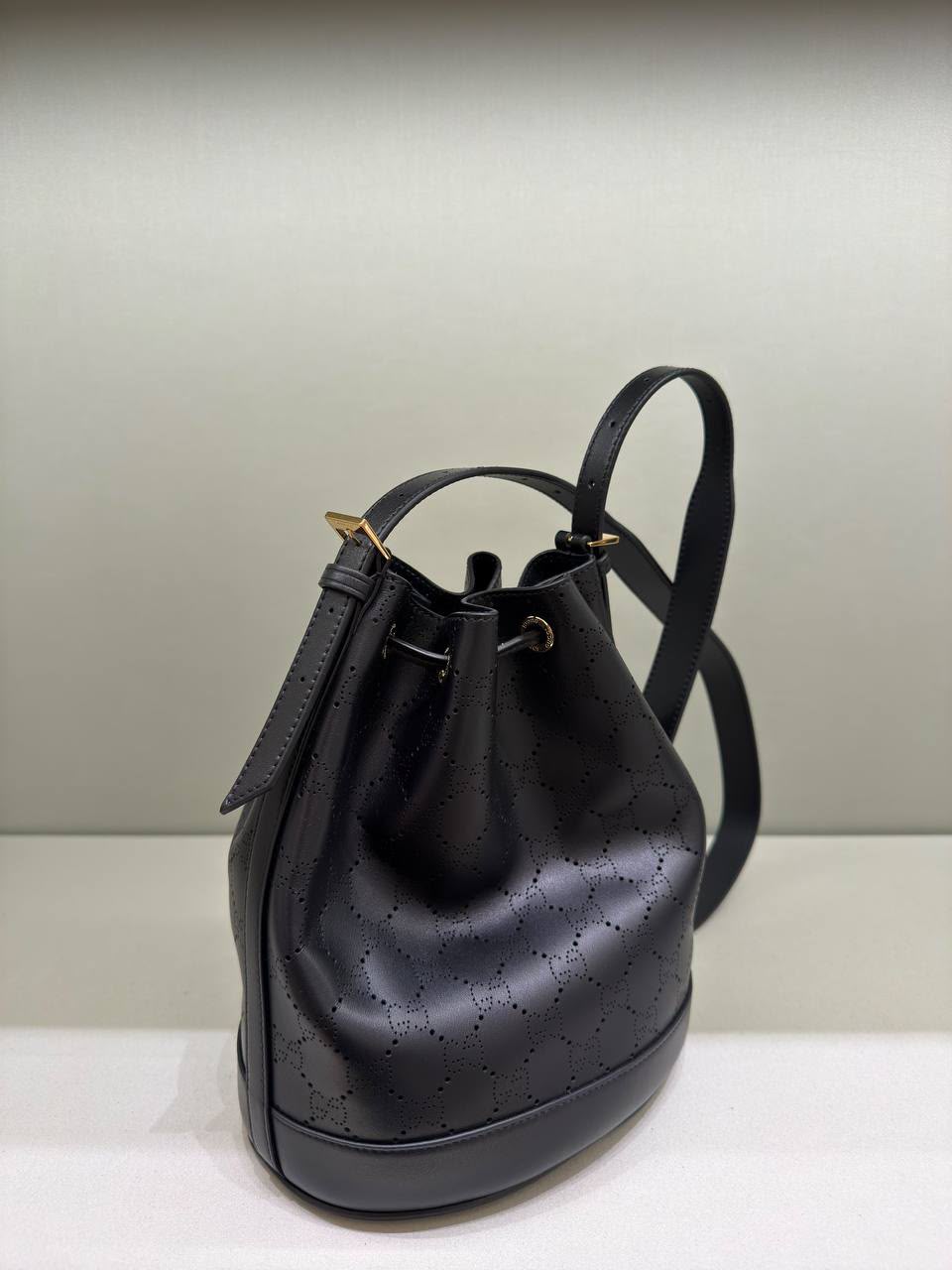 Small Bucket Bag in Perforated Triomphe Calfskin