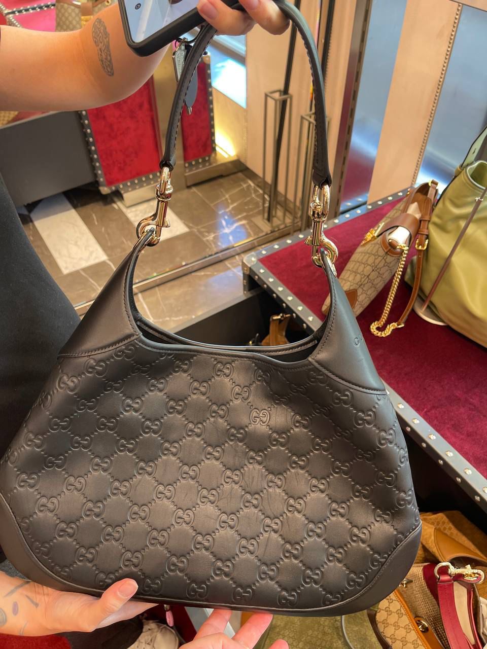 GG Embossed Hobo Bag