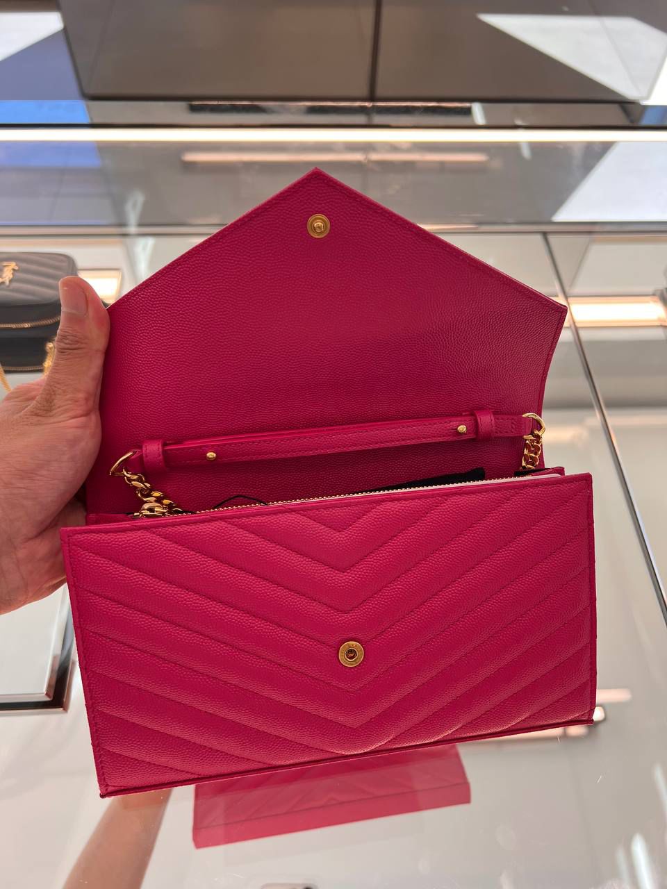 Monogram Envelope Clutch in Grain de Poudre Embossed Leather