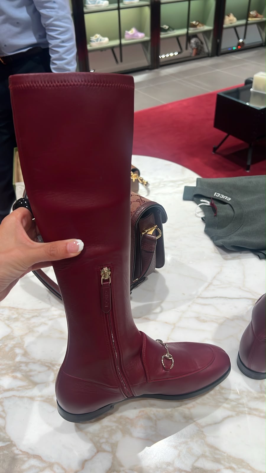 Horsebit knee-high boot