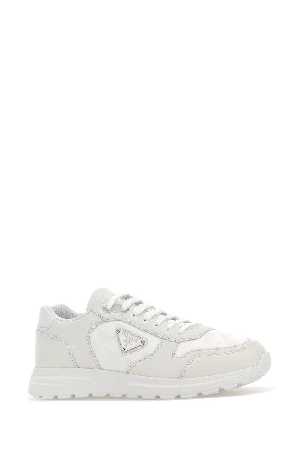 PRADA SNEAKERS For Men Exterior: 100% Leather 100% Fabric Interior: 100% Leather Sole: Rubber
