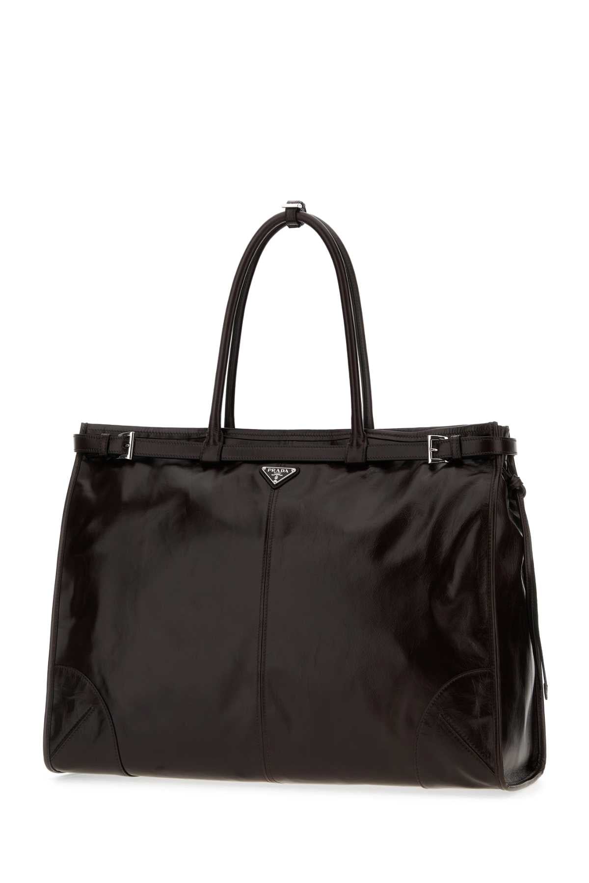 PRADA PELLE For Men Exterior: 100% Leather Lining: 100% Re-Nylon Finishing: Silver metal