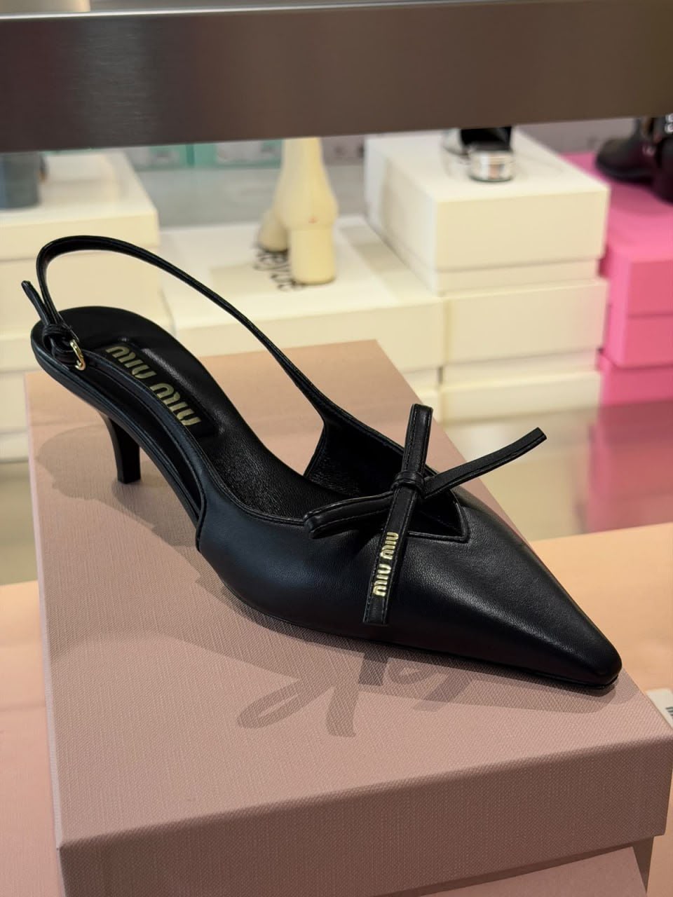 Leather slingback pumps with bow