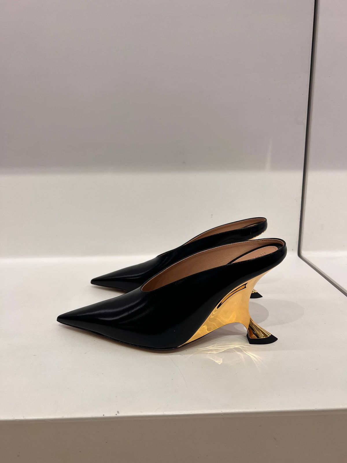 Sculptural Heel Mules