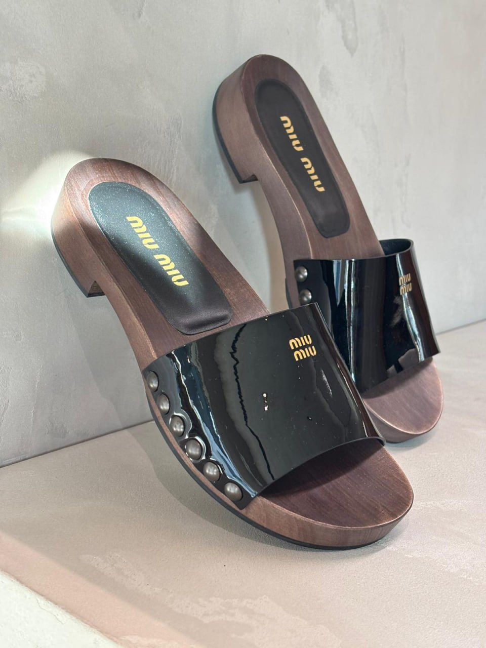 Patent leather clogs