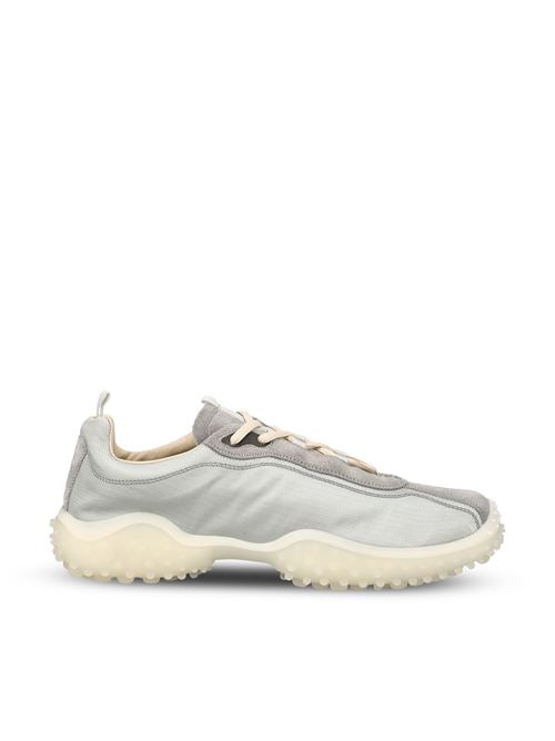 Sneakers realizzate in tessuto e cuoio