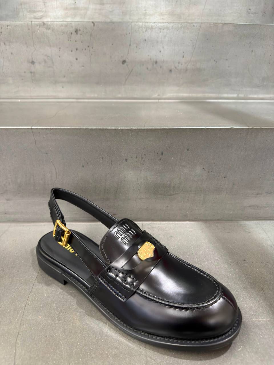 Brushed leather slingback loafers