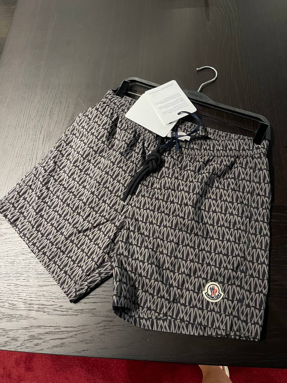 All-Over Logo Print Swim Shorts