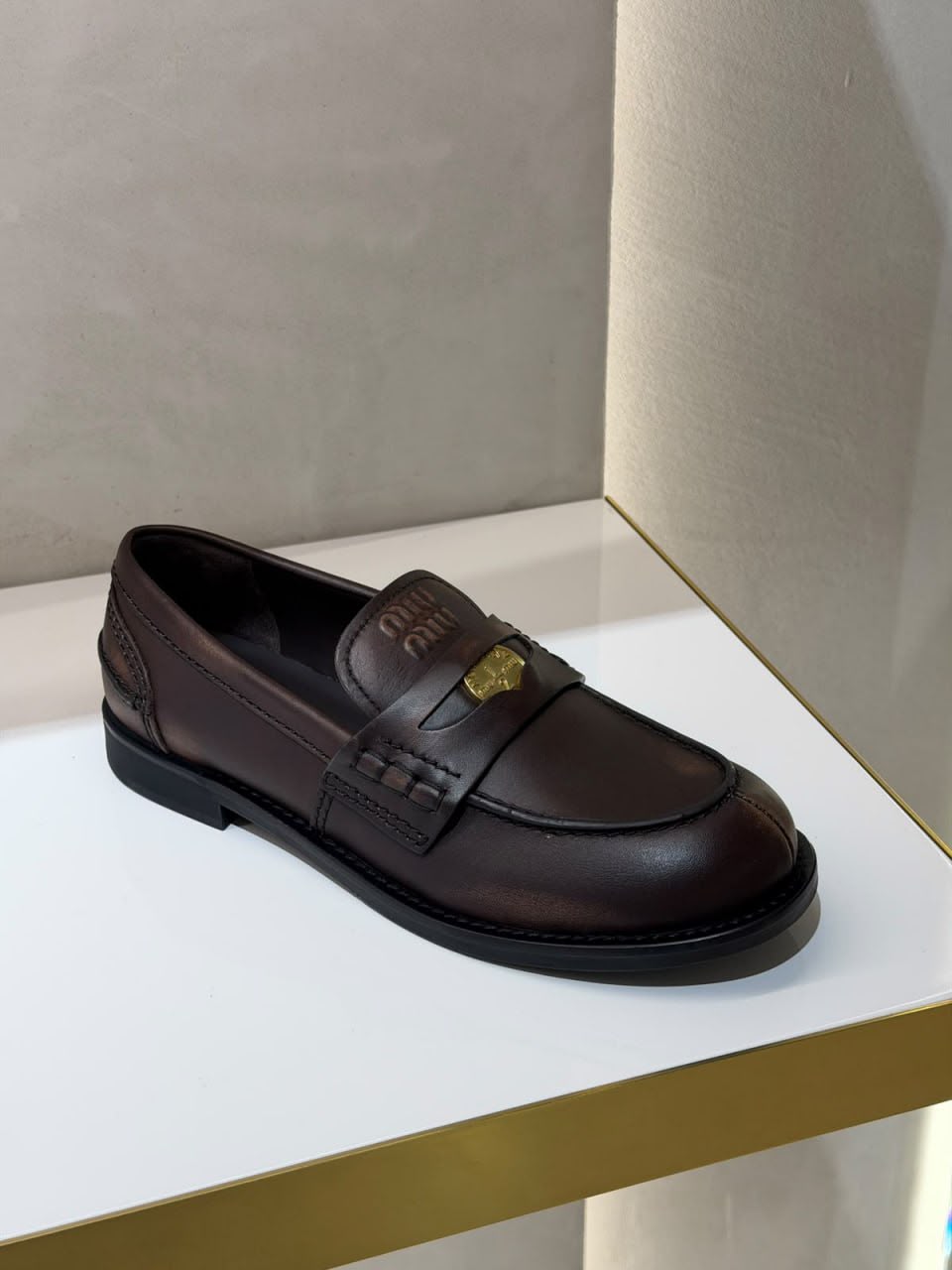 Leather loafers with logo