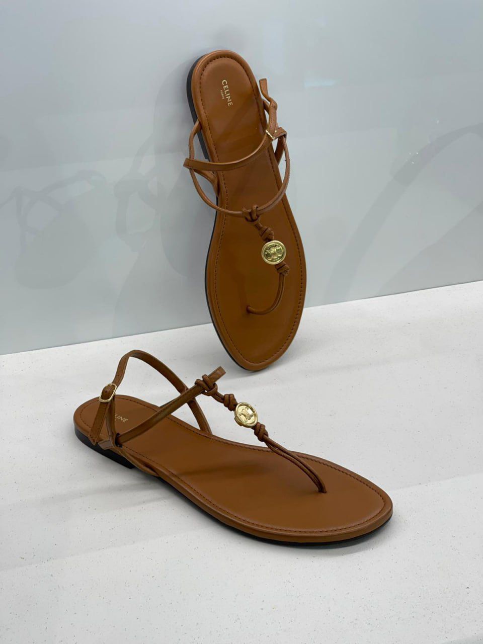 Triomphe Thong Sandals in Calfskin
