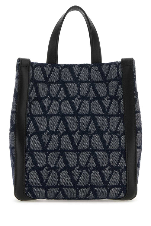 VALENTINO GARAVANI BORSA For Men Exterior: 100% Fabric 100% Leather Lining: 100% Fabric Finishing: Enameled metal