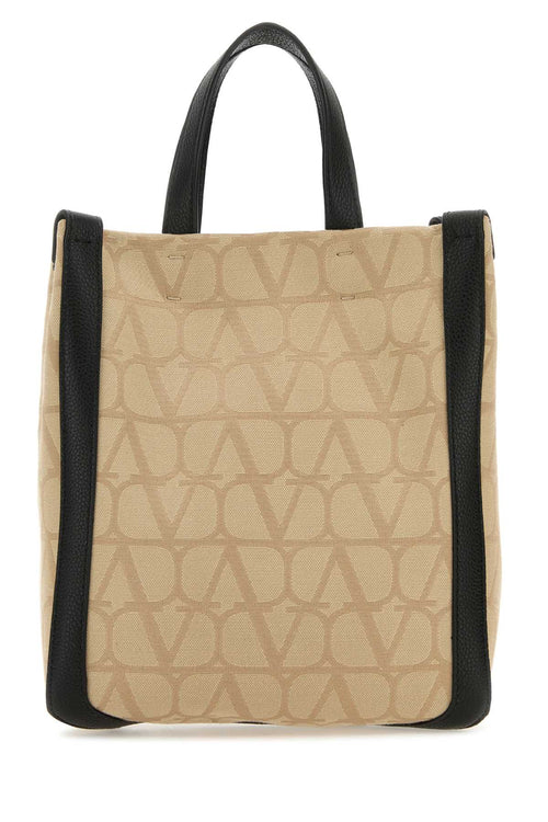 VALENTINO GARAVANI BORSA For Men Exterior: 100% Fabric 100% Leather Lining: 100% Fabric Finishing: Enameled metal