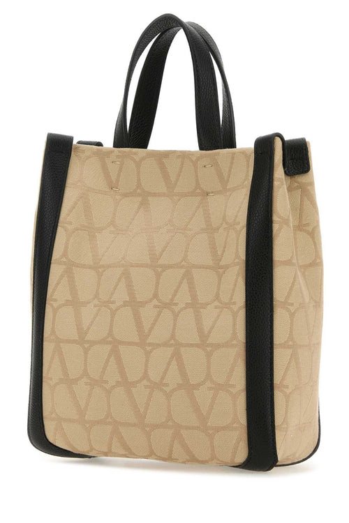 VALENTINO GARAVANI BORSA For Men Exterior: 100% Fabric 100% Leather Lining: 100% Fabric Finishing: Enameled metal