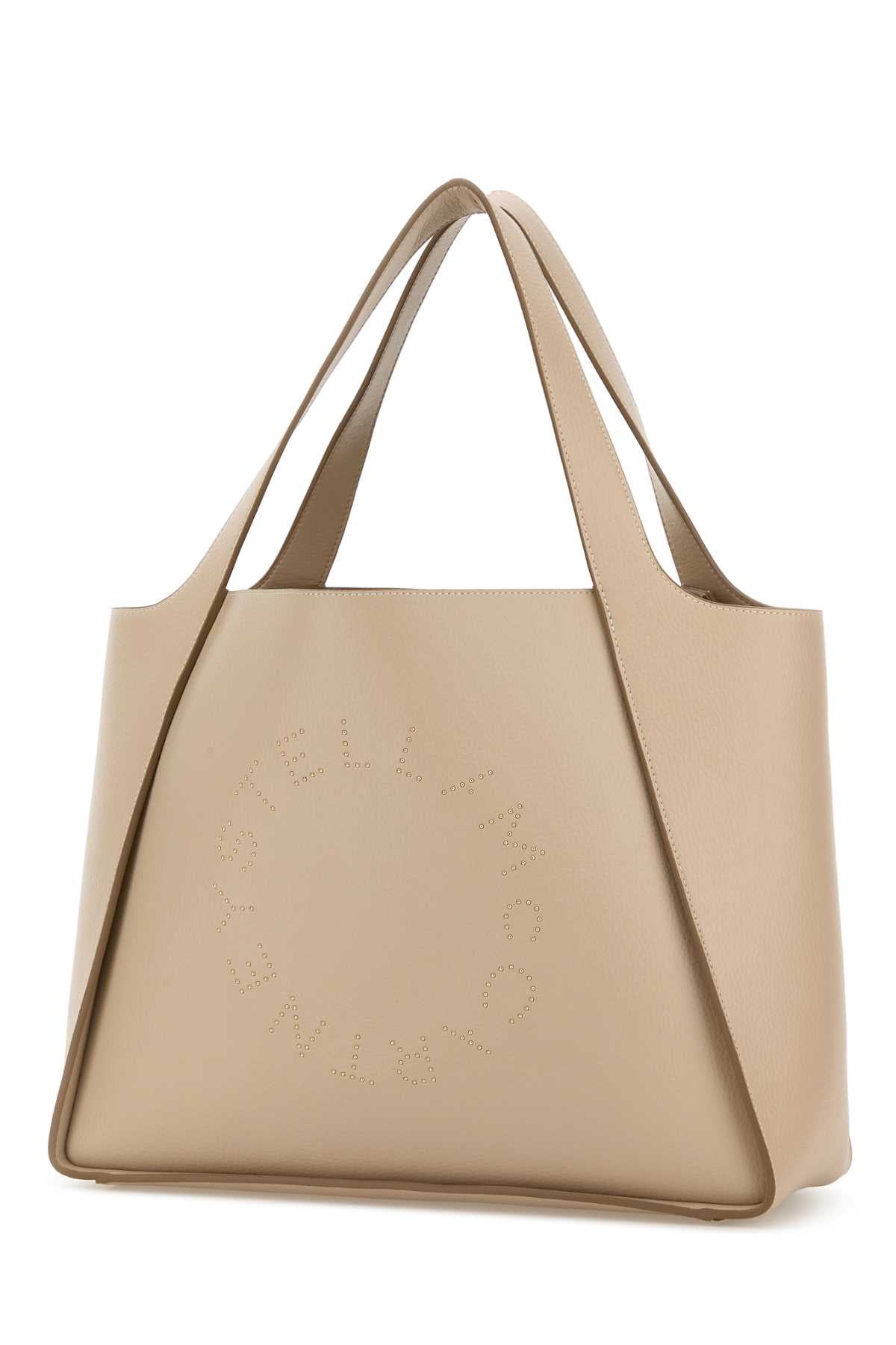 STELLA MCCARTNEY Logo Tote Bag Embossed Grainy Alter Mat W/Studded For Women Exterior: 47% Polyurethane 20% Bio-polyurethane 20% Recycled nylon, 13% Nylon Lining: 50% Nylon 50% Polyurethane Finishing: Golden metal