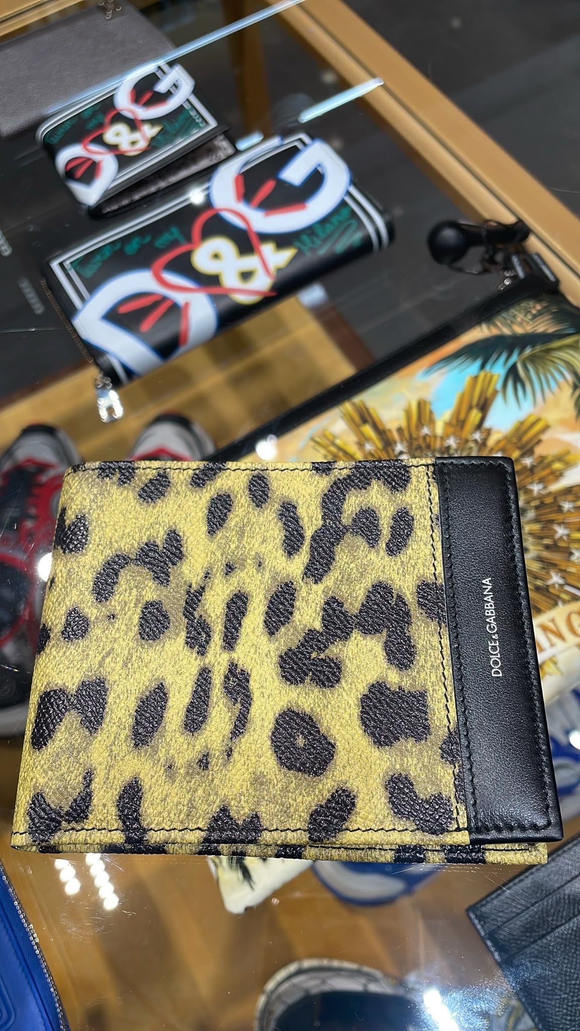Leopard-print bi-fold wallet