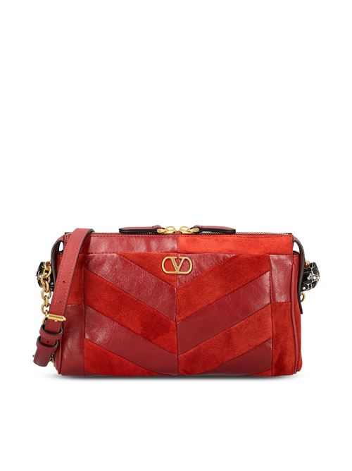 Borsa realizzata in suede e nappa