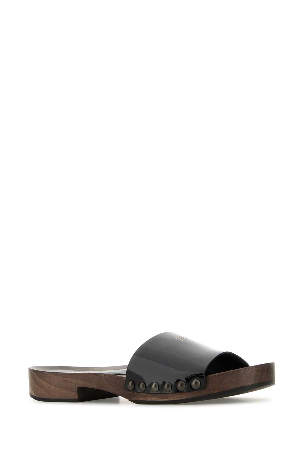 MIU MIU ZOCCOLI For Women Exterior: 100% Leather Interior : 100% Leather 100% Fabric Sole: Rubber