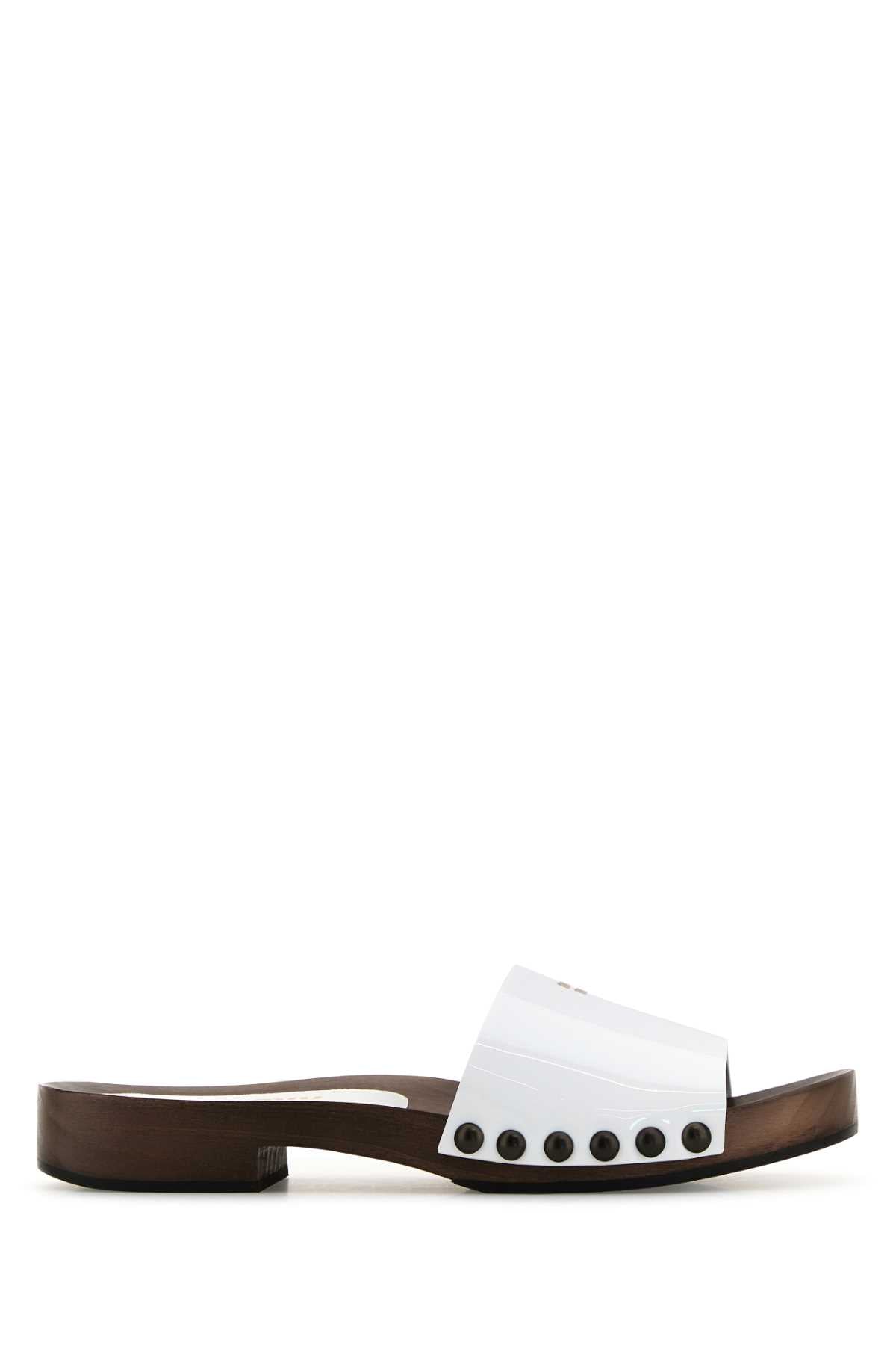 MIU MIU ZOCCOLI For Women Exterior: 100% Leather Interior : 100% Leather 100% Fabric Sole: Rubber