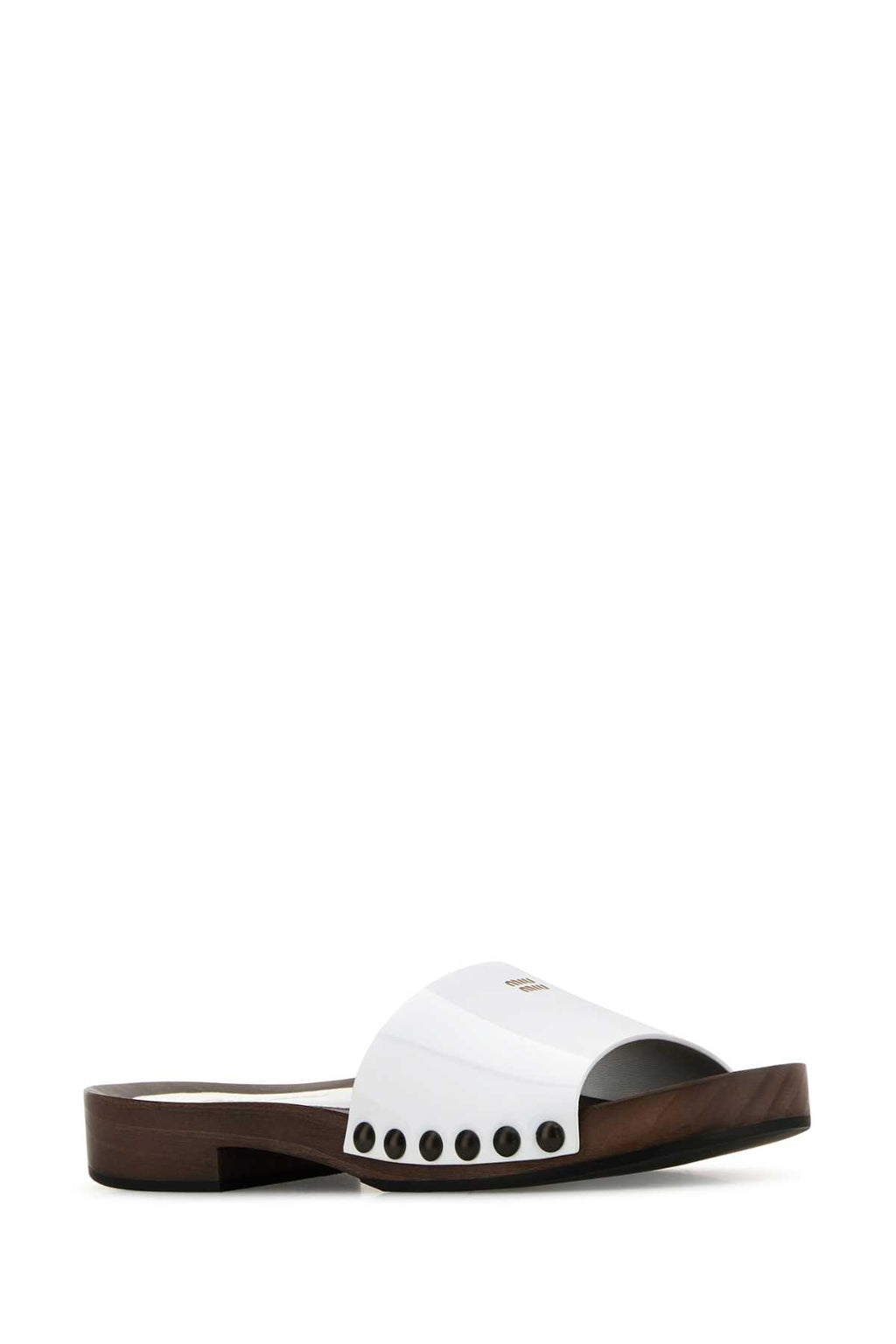 MIU MIU ZOCCOLI For Women Exterior: 100% Leather Interior : 100% Leather 100% Fabric Sole: Rubber