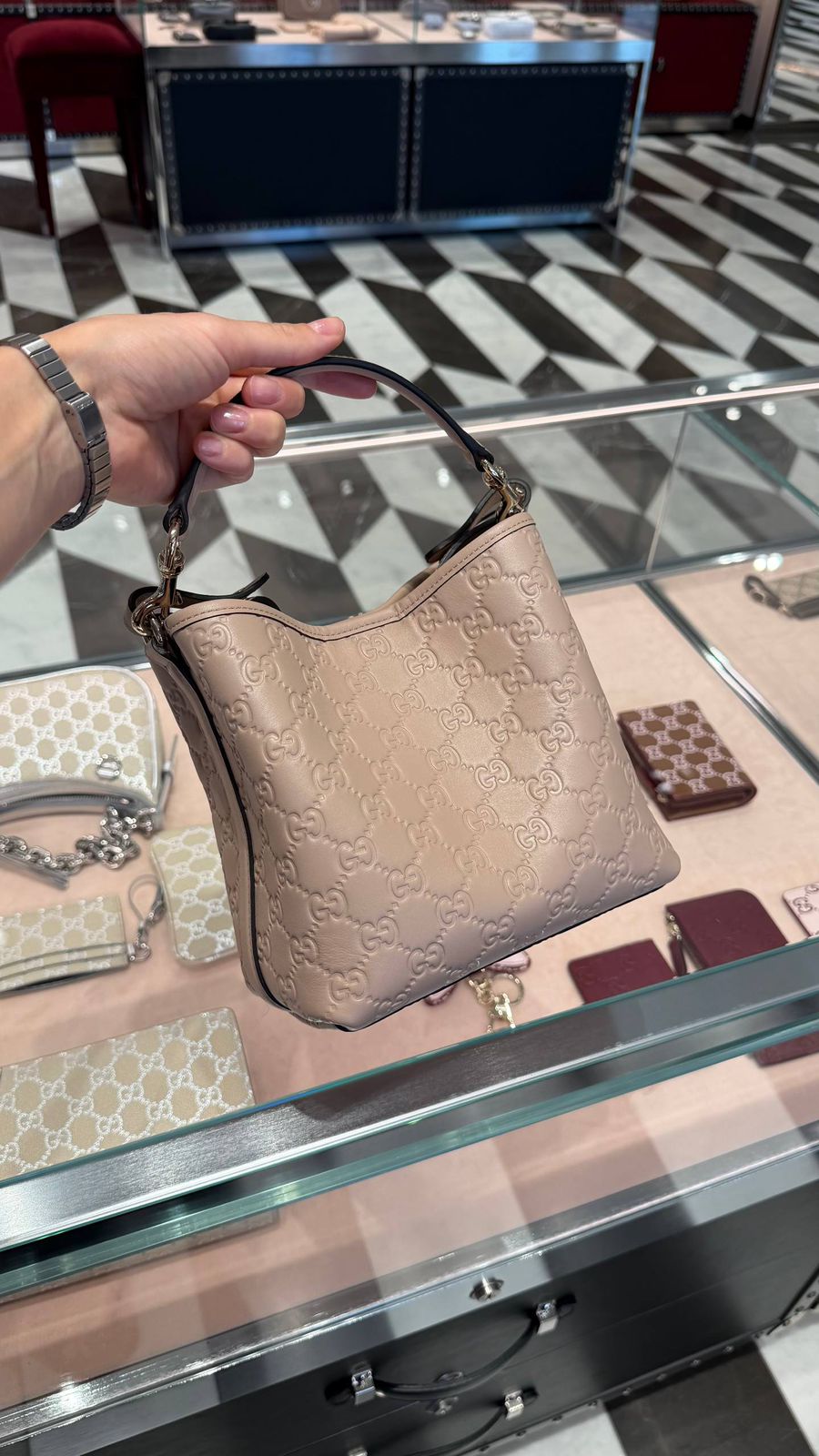 Gucci GG Embossed Mini Shoulder Bag