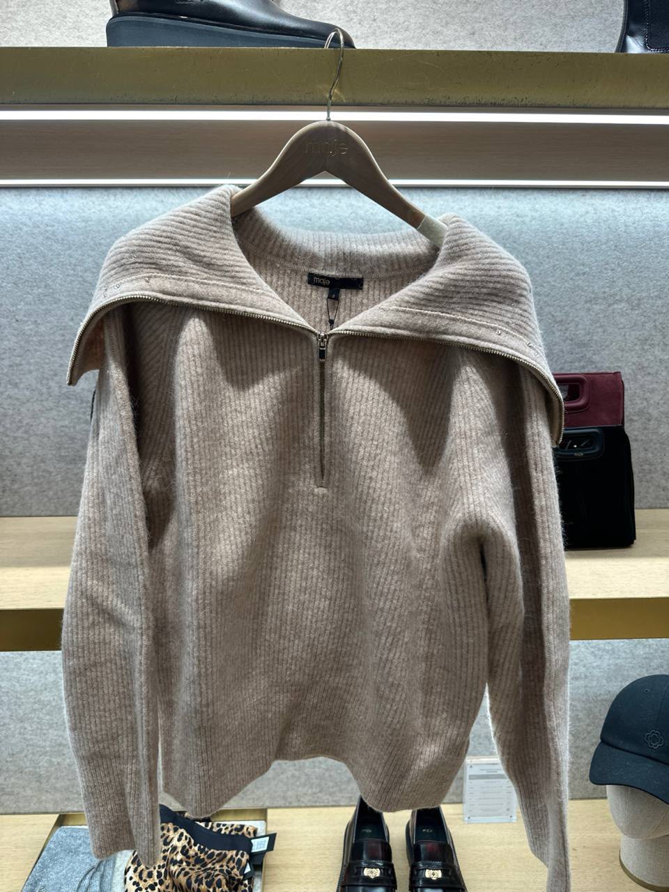 Ribbed knit sweater with zip-up collar