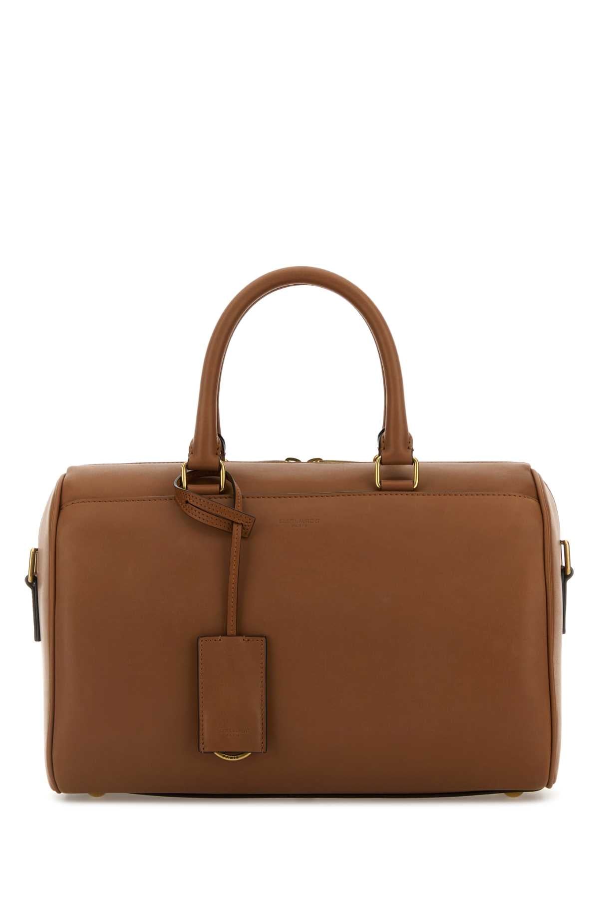 SAINT LAURENT YSL BO DUFFLE 6H For Women Exterior: 100% Leather Lining: 100% Suede Finishing: Antiqued golden metal