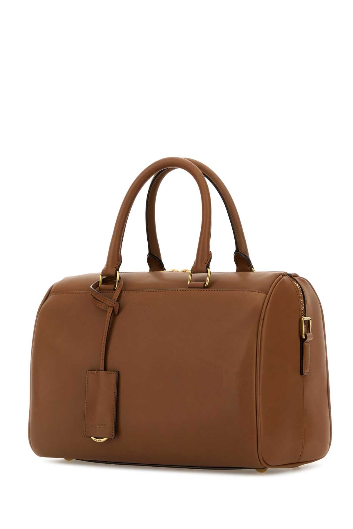 SAINT LAURENT YSL BO DUFFLE 6H For Women Exterior: 100% Leather Lining: 100% Suede Finishing: Antiqued golden metal