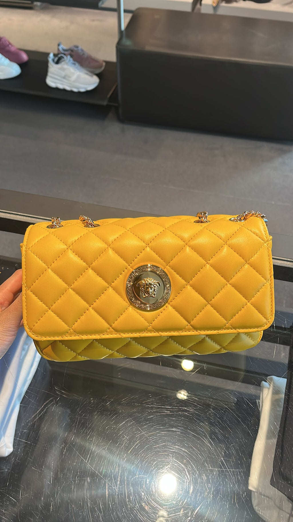 Quilted Leather Medusa Top Handle Bag