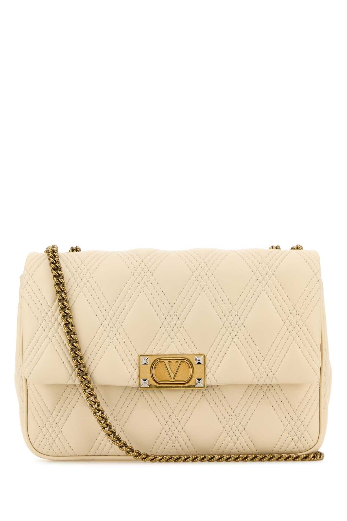 VALENTINO GARAVANI SHOULDER BAG | QUILTIE 67 For Women Exterior: 100% Nappa leather Lining: 100% Nappa leather Finishing: Antiqued golden brass